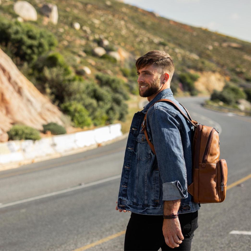 Single Compartment Backpack 45cm,Backpacks,Jekyll & Hide,Colt, with model carrying on walkway