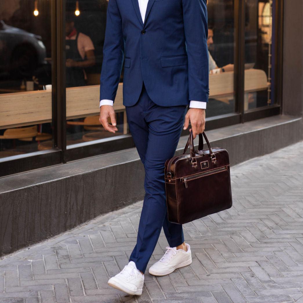 Slim Zip Top Briefcase,Briefcases,Jekyll & Hide,mocha, being carried by model in street