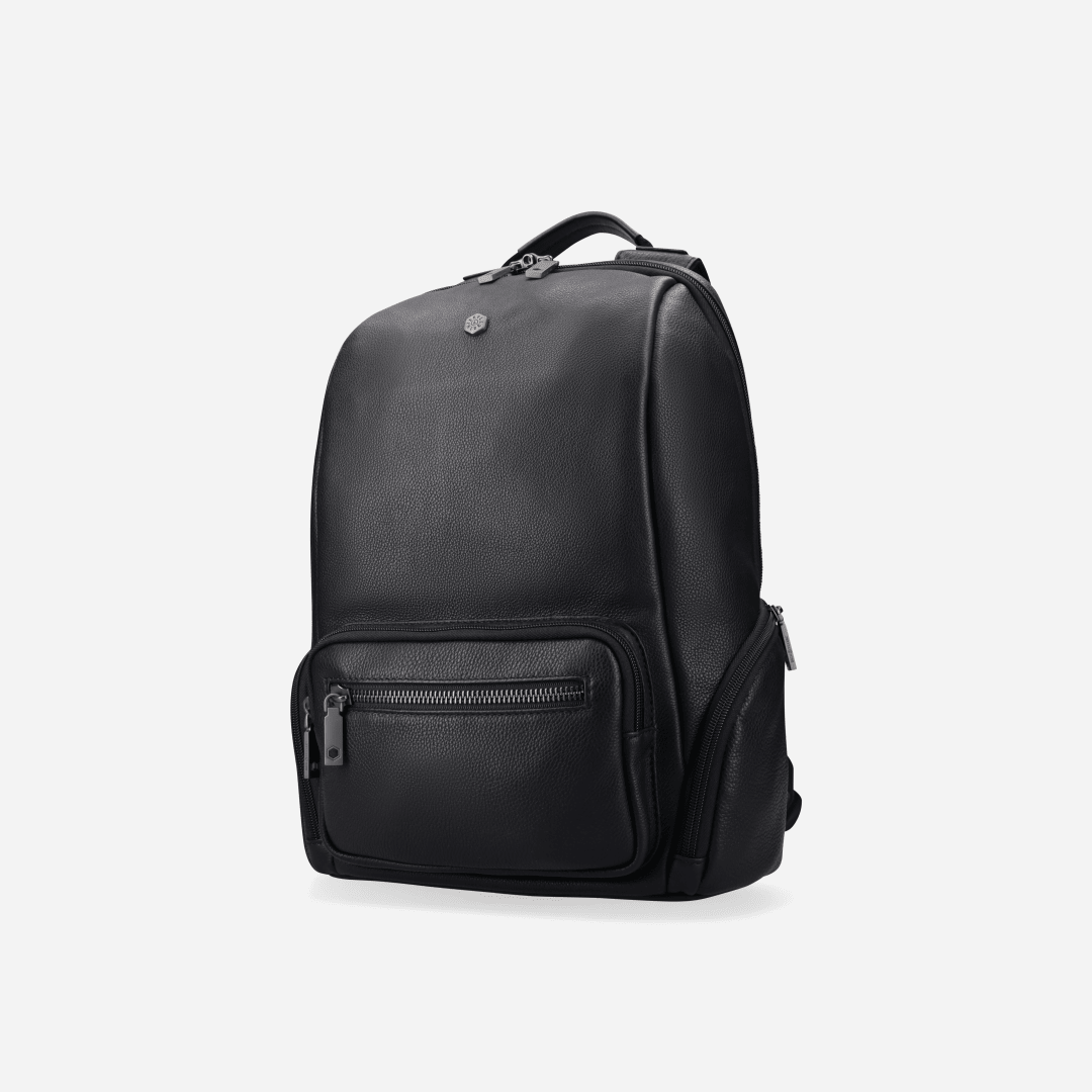 Black backpack on a light gray background