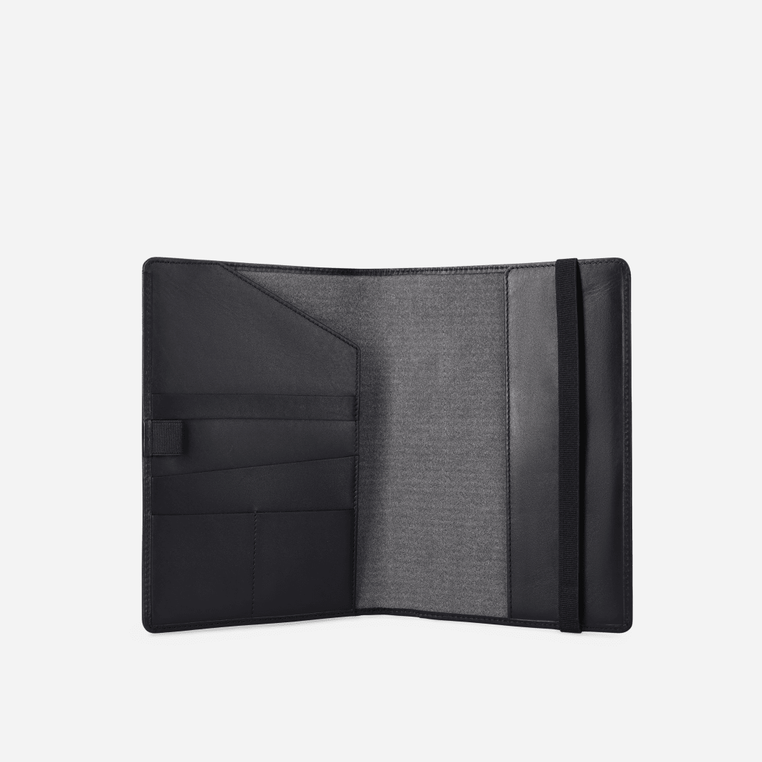 Open interior of Jekyll and Hide black leather A5 notebook cover showing card slots and grey lining