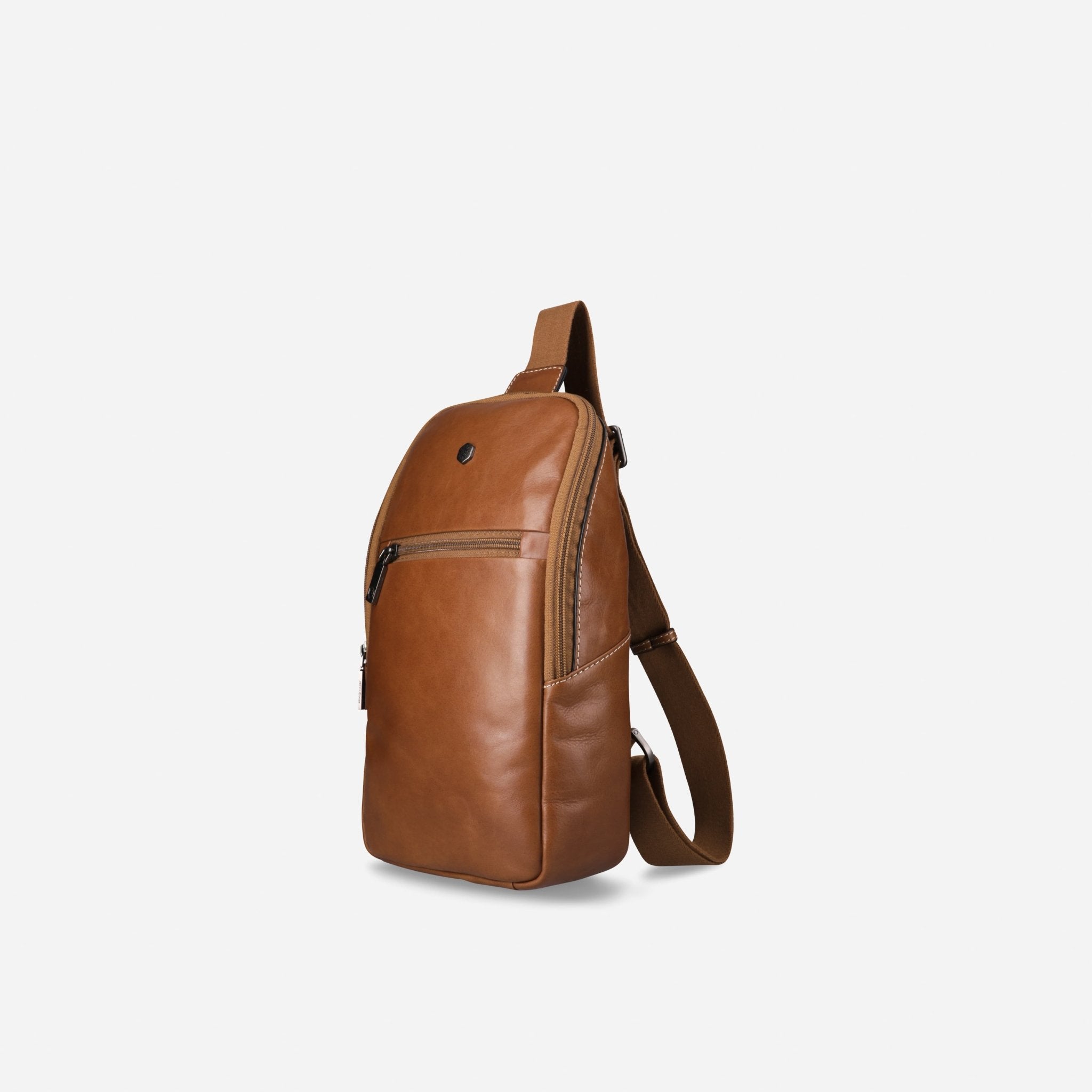 Jekyll and Hide tan leather single-strap backpack, angled front view