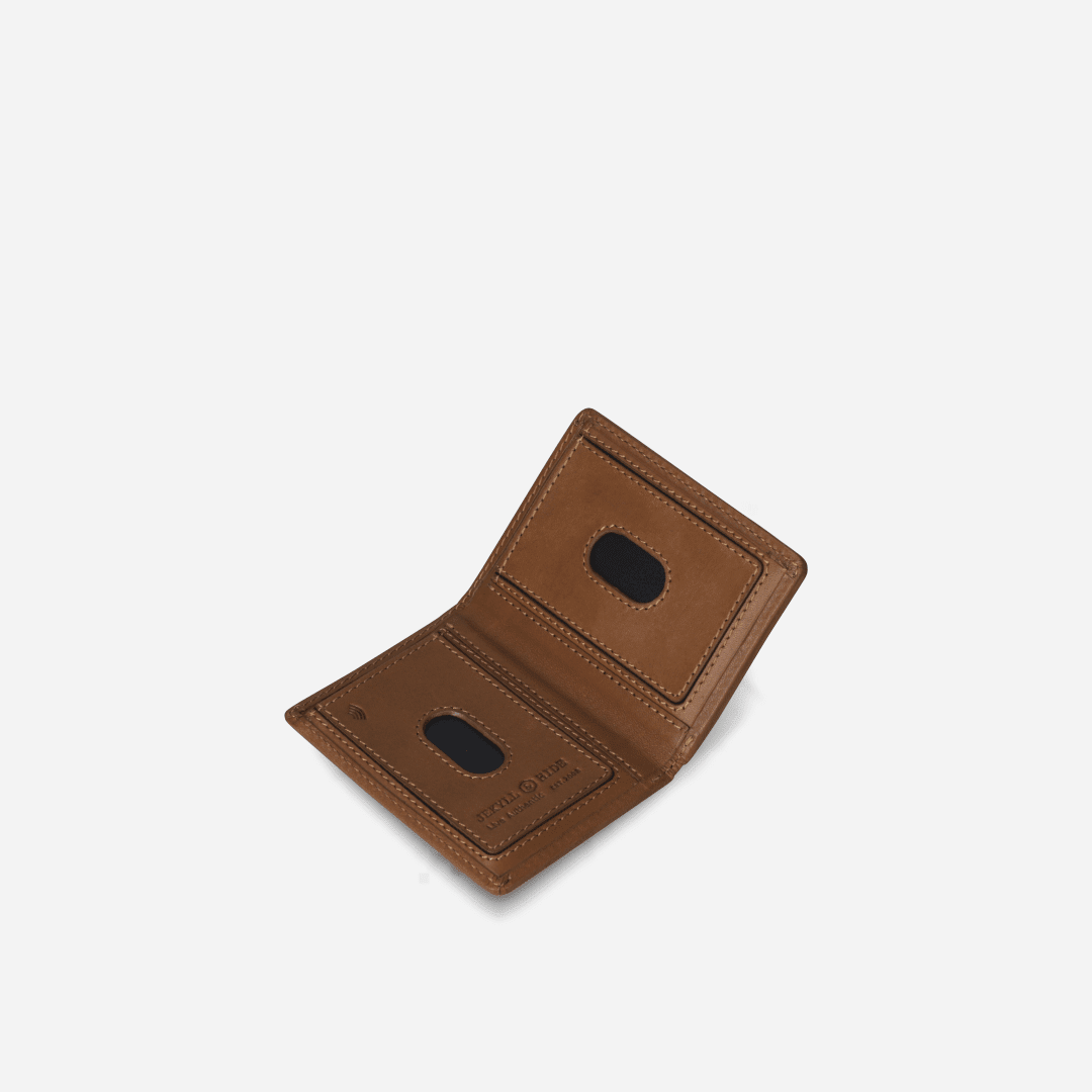 Open Jekyll and Hide tan leather elasticated card holder at an angle showing ID windows