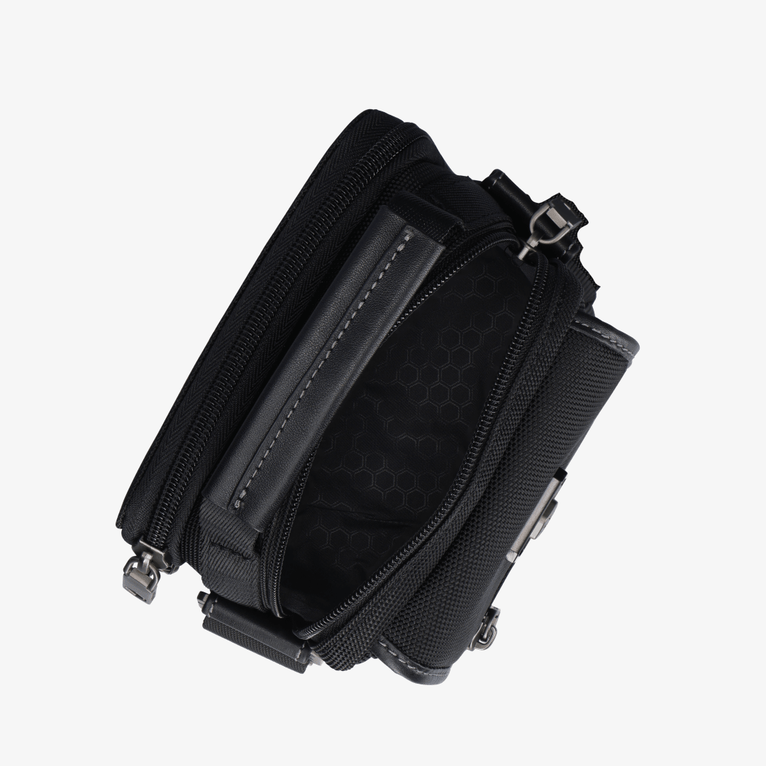 Open top view of Jekyll and Hide Tokyo black nylon crossbody bag showing zip pocket